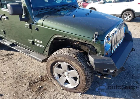 2009 Jeep Wrangler Unlimited Sahara z USA, uszkodzony, nr VIN 1J4GA59189L710032